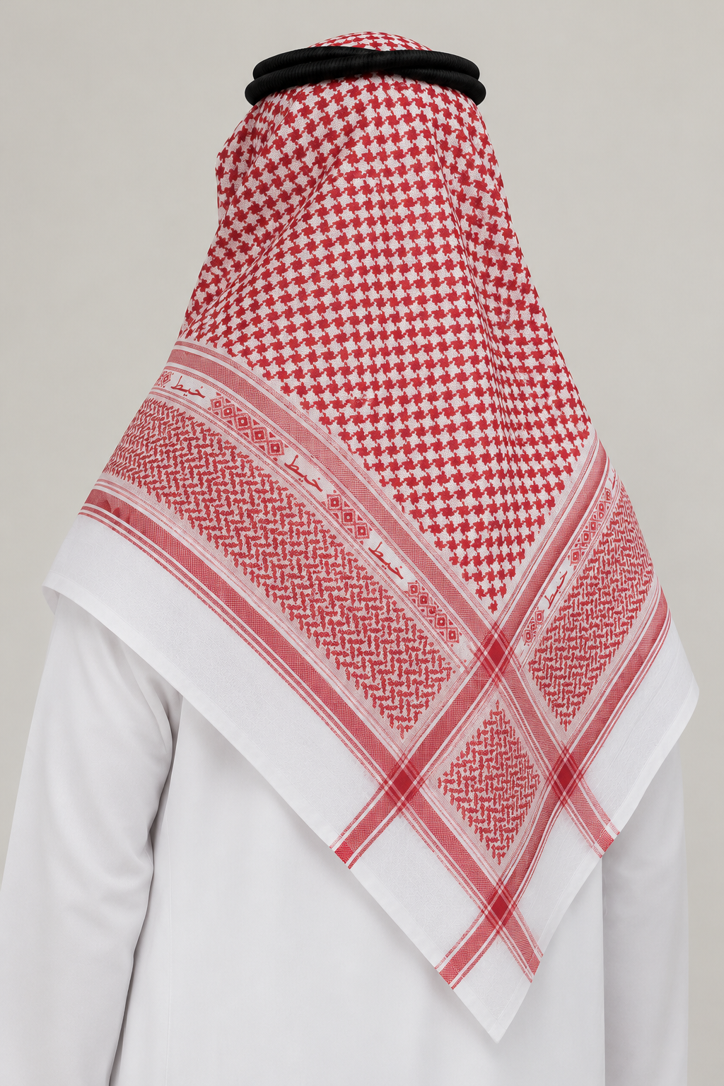 Saudi gentleman wearing the Classic Ruby red and white check ghutra (shemagh)